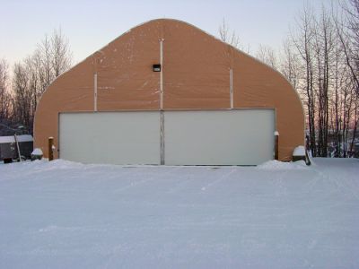 Aircraft hangar shade structure
